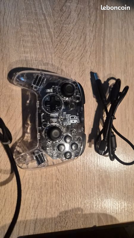Switch OLED, manette pro, paire de joy-con et 7 jeux (image 3)