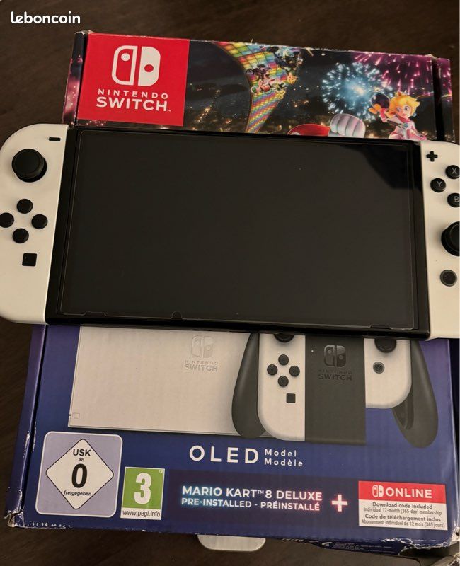 Switch OLED quasi neuve (image 1)