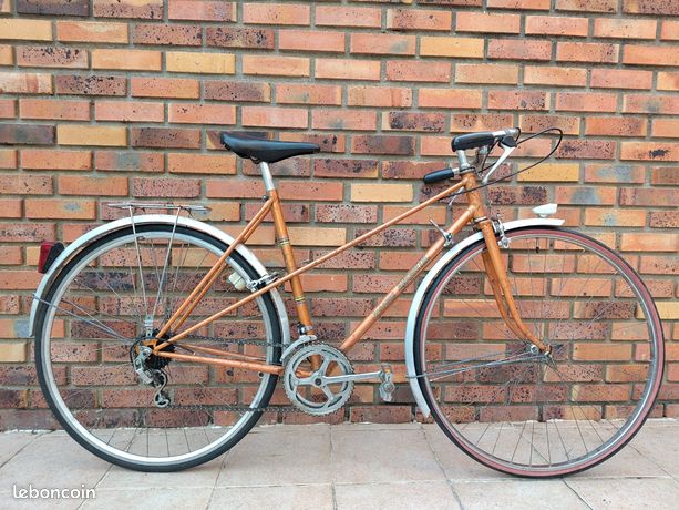 Vélo de ville/ VTC Jacques ANQUETIL orange Vélos
