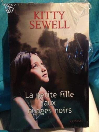 Livre la petite fille aux nuage noir neuf (image 1)