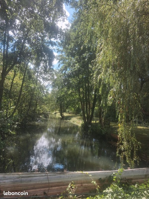 Terrain de loisir avec étang le long de la somme · à Condé-Folie · 45 000 €