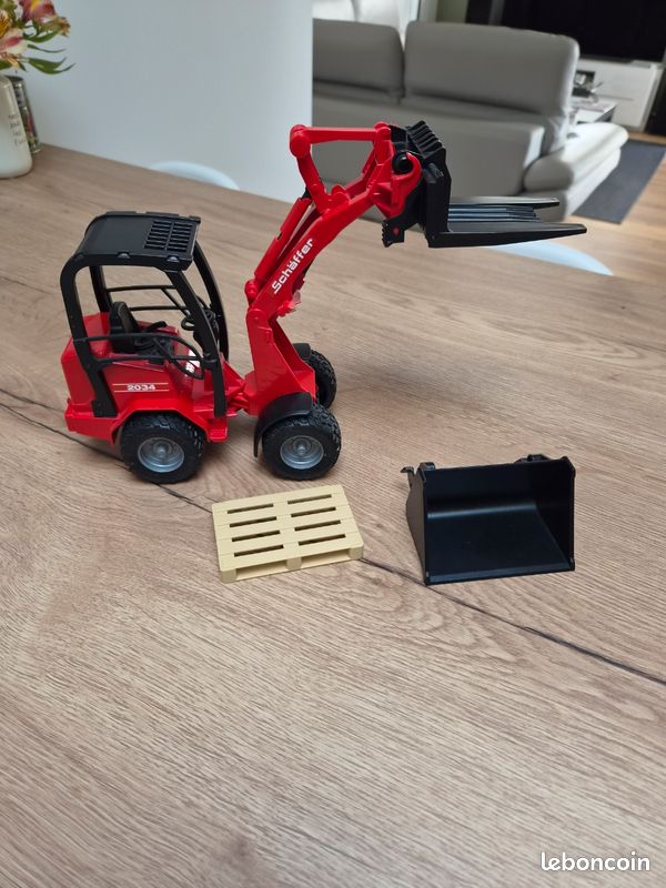 Chargegeuse Chargeuse articulée avec accessoires Bruder comme neuve - Jeux & Jouets