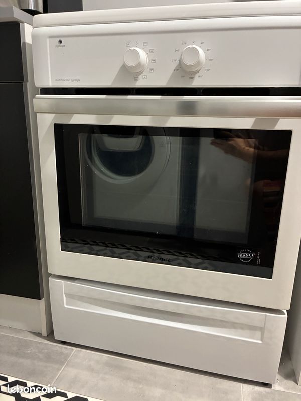 Cuisinière induction four pyrolyse BRANDT (image 1)