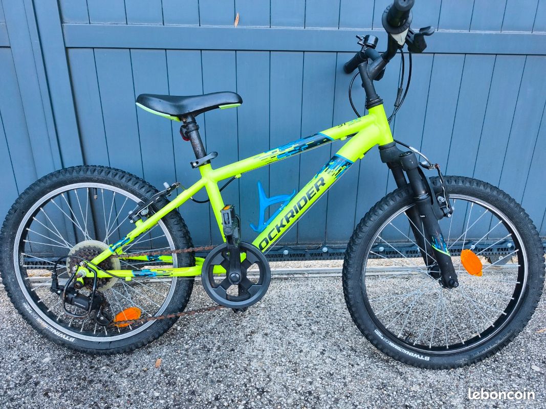 VTT ENFANT ROCKRIDER ST 500 20 POUCES 6-9 ans Jaune Fluo