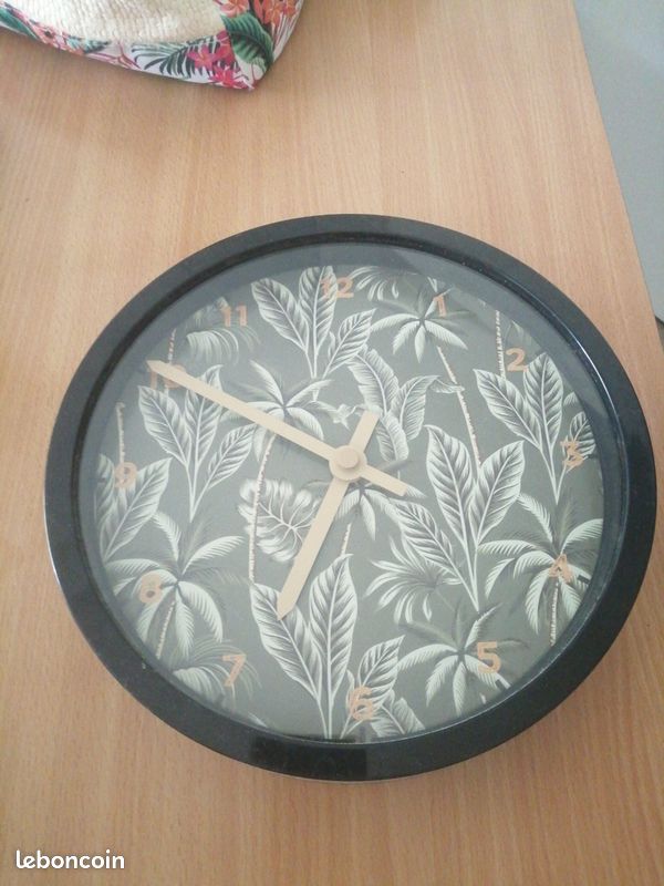 Pendule motif exotique (image 1)