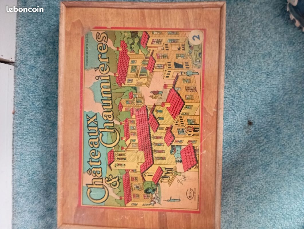 Jeu construction en bois château et chaumière (image 1)