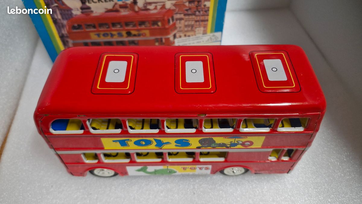 Jouet en tôle à friction Huki représ... | Jouets et maquettes: enchères