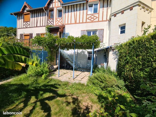 Maison jumelée avec jardin