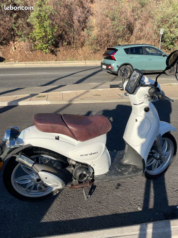 Sctoor Aprilia scarabeo 50cc Motos