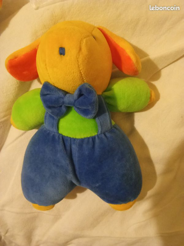 Doudou chien Vulli tête jaune intérieur oreilles orange pantalon à