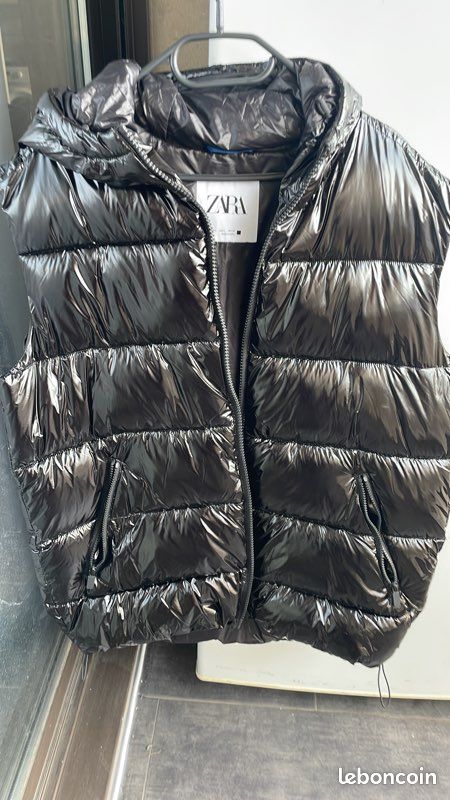 Doudoune noire brillante zara sans manche jamais portée taille l