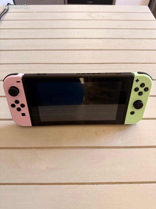 Switch + 4 Joy-Con + Pro Controller + 8 juegos + microSD 250 Go + dock + grip + housse (image 2)