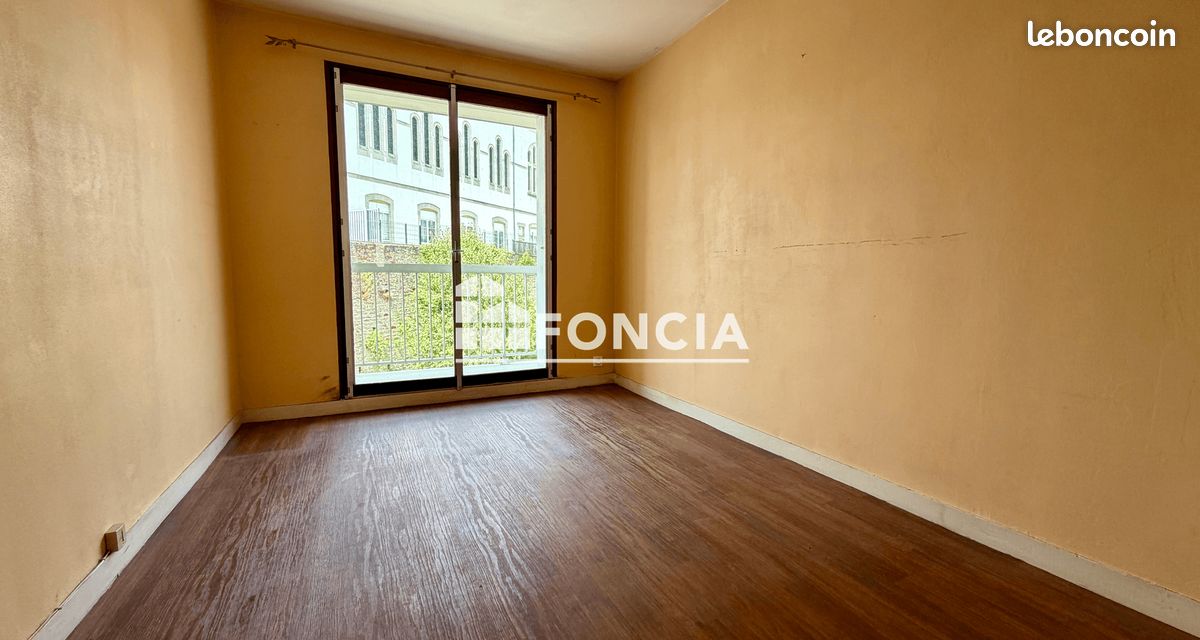 Centre-ville, Appartement T3 de 63 m² avec balcon, cave et parking privatif (image 5)