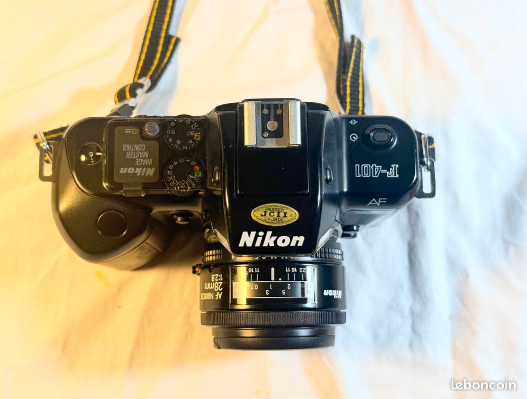 Appareil Photos Reflex NIKON F-401 +Objectif Nikon AF Nikkor -28 mm/ 1:28mm-=TELE OBJ+Flash +Sac a dos (Négociable ) (image 1)